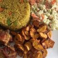 Fried Rice with a protein, Fried Plantain, and Salad