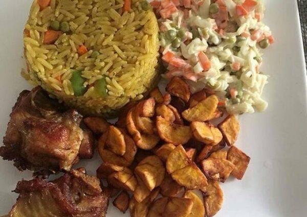 Fried Rice with a protein, Fried Plantain, and Salad